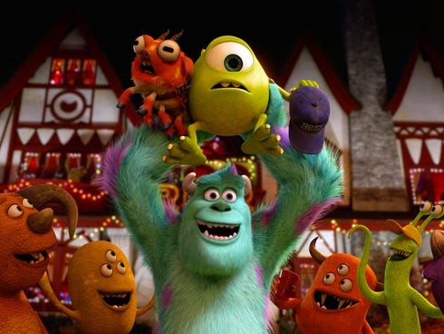 Sulley and his one-eyed buddy Mike, center, return in the prequel 'Monsters University.'