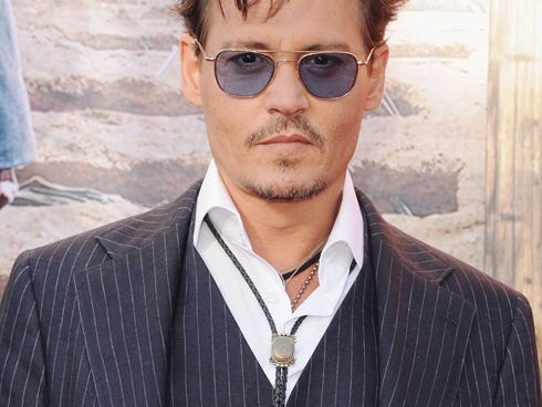 Johnny Depp arrives at the world premiere of 'The Lone Ranger' at Disney California Adventure Park in Anaheim, Calif., on Saturday night.