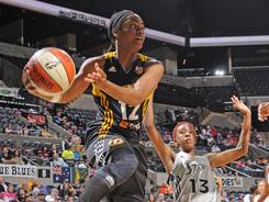 Guard Ivory Latta, driving past Silver Stars guard Danielle Robinson, scored 15 points and added four assists in the Shock's 80-70 win.