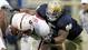 Notre Dame linebacker Manti Te'o, right, trying to slow down Stanford running back Stepfan Taylor in South Bend.