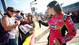 Danica Patrick greets fans on the grid during qualifying for the NASCAR Nationwide Series Dollar General 300 at Charlotte Motor Speedway on Oct 12, 2012 in Charlotte, N.C.