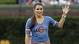 Danica Patrick waves before throwing out a ceremonial first pitch before a baseball game between the Houston Astros and the Chicago Cubs in Chicago, Sunday, July 1, 2012. 