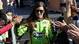 Danica Patrick high-fives fans prior to the NASCAR Sprint Cup Series race at Phoenix International Raceway.