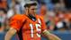 Worst haircut ever? Broncos quarterback Tim Tebow sports a Friar Tuck look for his rookie hazing in Denver in 2010.