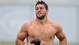 Jets quarterback Tim Tebow leaves the field following training camp on July 28, 2012.
