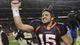 Broncos quarterback Tim Tebow celebrates after beating the Steelers 29-23 in overtime of an NFL wild card playoff game on Jan. 8, 2012, in Denver. Tebow's 80-yard touchdown pass to Demaryius Thomas on the first play of the extra period clinched the victory.