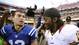 Colts quarterback Andrew Luck, left, talks with Robert Griffin III after an NFL preseason game, but the two will be forever linked. Luck was drafted No. 1 overall, ahead of Griffin in the 2012 NFL draft.