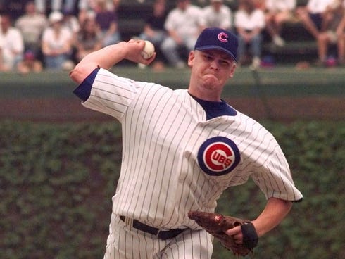 In his fifth start, Cubs rookie Kerry Wood tied the major league record with 20 strikeouts in a nine-inning game, pitching a one-hitter to beat the Astros 2-0.