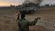 An Israeli soldier guides a tank to a new position at a staging area near the Israel Gaza Strip border, southern Israel on Nov. 22.