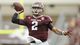 Manziel passes against Arkansas.