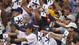 Fans hold up asterisks after San Francisco's Barry Bonds hit career homer 755 against the Padres at Petco Park.