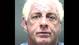 Wrestler Ric 'The Nature Boy' Flair surrendered to North Carolina cops on misdemeanor charges in November 2005 after being accused of grabbing a fellow motorist by the throat and then kicking and denting the man's Toyota. He was booked by the Mecklengurg County Sheriff's Office and was released on $1000 bond.