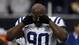 Indianapolis Colts defensive end Cory Redding (90) wipes his eyes while observing a moment of silence in honor of the victims of the Sandy Hook Elementary shooting in Newtown, Conn., during the first quarter against the Houston Texans at Reliant Stadium.