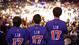 Fans of the Knicks' Jeremy Lin show excitement during a home game against the Los Angeles Lakers in February, during the height of Linsanity.