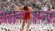 Xiang Liu kisses a hurdle after competing the mens 110m hurdles heats during the London 2012 Olympic Games. Liu crashed with an Achilles injury during the heat.