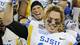 San Jose State quarterback David Fales lifts the Military Bowl trophy Thursday after beating Bowling Green 29-20.