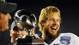 Baylor quarterback Nick Florence smiles next to the Holiday Bowl trophy after a 49-26 win Thursday vs. UCLA.