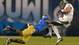UCLA safety Andrew Abbott tackles Baylor quarterback Nick Florence during Thursday's Holiday Bowl.