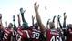 South Carolina players salute the fans after the 33-28 win in the Outback Bowl.