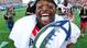 Georgia's Alexander Ogletree celebrates with the Capital One Bowl trophy after the win over Nebraska.