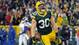 Packers fullback John Kuhn (30) reacts after scoring a touchdown against the Vikings during the third quarter.