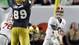 Alabama quarterback A.J. McCarron (10) passes over leaping Notre Dame defensive lineman Kapron Lewis-Moore (89).