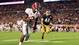 Alabama receiver Amari Cooper sprints past the Notre Dame defense and into the end zone for a 34-yard touchdown during the third quarter. Cooper's score put the Crimson Tide ahead 35-0.