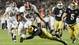 Alabama running back Eddie Lacy (42) eludes a Note Dame defender on a second-quarter run.