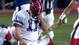 Bills kicker Scott Norwood (11) walking off the field in dejection after missing wide right on a 47-yard field goal on the last play of Super Bowl XXV, giving the Giants a 20-19 win.