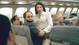 In this 2006 Ameriquest ad titled 'Turbulence', a woman tries to pass by two sleeping passengers seated next to her on her way to the restroom and turbulence accidentally knocks her into the lap of one of the passengers and the lights turn on. Tag line is: 'Don't Judge too quickly. We Won't'.