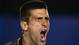 Novak Djokovic of Serbia survived an epic five-setter against Stanislas Wawrinka of Switzerland to advance to the quarterfinals.