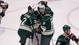 His Minnesota Wild teammates mob goalie Josh Harding after he finishes with a 24-save shutout.