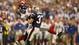 XLII: During the Giants' game-winning drive against the Patriots, perhaps the most memorable play in Super Bowl history occurred. Eli Manning almost got sacked before escaping and heaving a pass over the middle where David Tyree, with James Harrison latched to him, made an improbable catch with the assist of his helmet for a 38-yard gain. New York goes on to score the winning touchdown to defeat New England 17-14 and end the Patriots' bid for perfection.