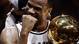 David Robinson won his second NBA title in his final season, as the Spurs beat the Nets in six games.