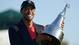 Tiger Woods hoists the championship trophy after winning the Arnold Palmer Invitational on March 25, 2012, his first PGA Tour tournament win in 30 months.