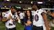 Entertainment Tonight personality Rocsi Diaz, center, interviews Baltimore Ravens defensive back Emanuel Cook, left, and defensive end Pernell McPhee during media day in preparation for Super Bowl XLVII against the San Francisco 49ers at the Mercedes-Benz Superdome.