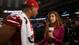 Inside Edition guest correspondent Katherine Webb (right) interviews San Francisco 49ers linebacker Clark Haggans during media day in preparation for Super Bowl XLVII against the Baltimore Ravens at the Mercedes-Benz Superdome.