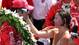 IndyCar driver Dario Franchitti celebrates in victory lane with wife Ashley Judd after winning the 2012 Indianapolis 500 at the Indianapolis Motor Speedway.