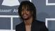 Lupe Fiasco arrives at the Grammys.