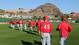 Angels players head to the practice fields to stretch at Tempe Diablo Stadium.