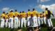Pirates pitchers and catchers assemble on the field during a workout session at Pirate City in Bradenton, Fla.