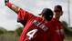 Cardinals catcher Yadier Molina gestures to fans as  J.R. Towles looks in Jupiter, Fla.