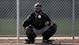 Chicago White Sox catcher Tyler Flowers catches a ball during spring training in Phoenix on Feb. 15, 2013.
