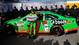 Danica Patrick poses with the pole winner sign after becoming the first woman to win the Daytona 500 pole position on Feb. 17, 2013.