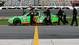 Danica Patrick gets a hand from her crew as she prepares to take the track for qualifying practice for the 2013 Daytona 500.