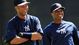 New York Yankees shortstop Derek Jeter (left) and second baseman Robinson Cano laugh it up during practice.