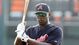 Justin Upton, now in an Atlanta Braves uniform, prepares for the  first game of the spring.