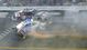 NASCAR Nationwide Series drivers Kyle Larson (32) and Brad Keselowski (22) cross the finish line as they crash on the final lap during the DRIVE4COPD 300 at Daytona International Speedway.
