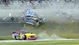 NASCAR Nationwide Series driver Kyle Larson (32) , Travis Pastrana (60) , Nelson Piquet Jr (30) and Brad Keselowski are involved in a final lap crash during the DRIVE4COPD 300 at Daytona International Speedway.