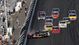 NASCAR Nationwide Series driver Brad Keselowski (22) spins Regan Smith (7) on the last lap of the DRIVE4COPD 300 at Daytona International Speedway.